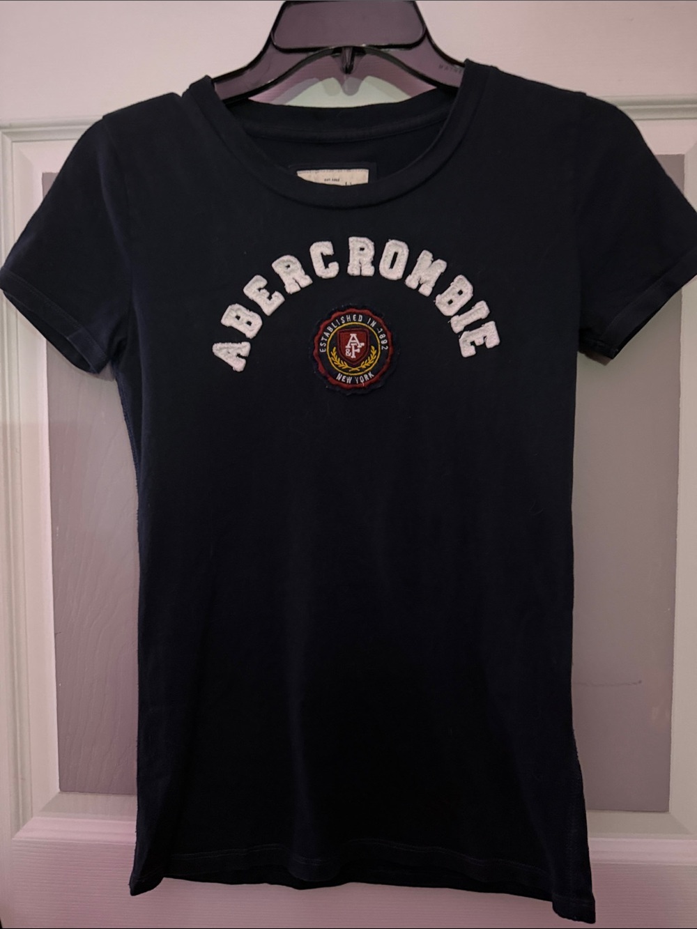 Abercrombie & Fitch Navy Short-Sleeve Tee with White Arch Logo and Red Crest